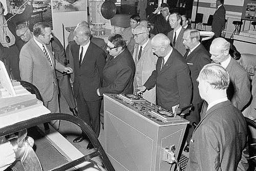 A black-and-white photograph of a trade fair from an earlier period